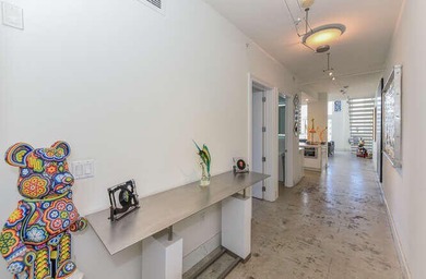 The main level offers a newer custom kitchen with marble - photo 6