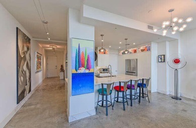 The main level offers a newer custom kitchen with marble - photo 8
