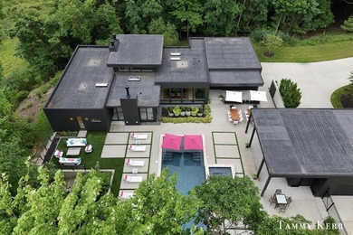Set privately within WestShore, this striking modern compound - photo 3