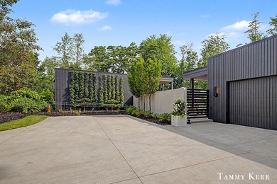 Set privately within WestShore, this striking modern compound - photo 10