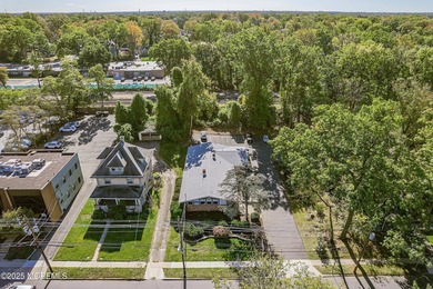 GREAT Spot w Lots of Potential! THREE UNiTS..First Floor Upper: