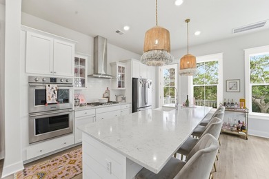 Welcome to this stunning elevated marsh front home on The Island - photo 18