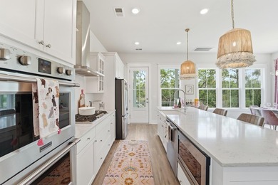 Welcome to this stunning elevated marsh front home on The Island - photo 19