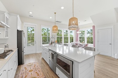 Welcome to this stunning elevated marsh front home on The Island - photo 23