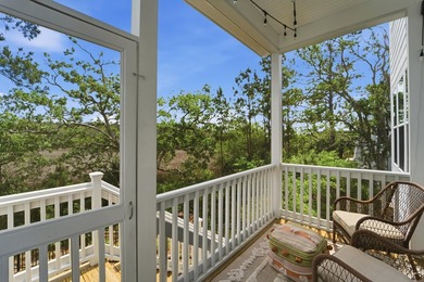 Welcome to this stunning elevated marsh front home on The Island - photo 31