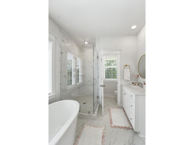 Welcome to this stunning elevated marsh front home on The Island - photo 39