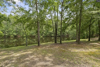 An all-brick home deserves a setting to match, and this property - photo 3