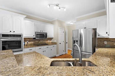 An all-brick home deserves a setting to match, and this property - photo 4