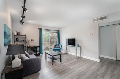 This newly renovated 1-bedroom, 1-bath condo offers modern - photo 2