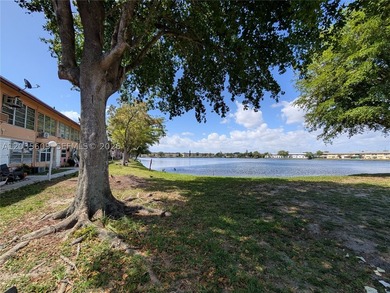 This bright and spacious corner unit is in a 55+ community with - photo 2
