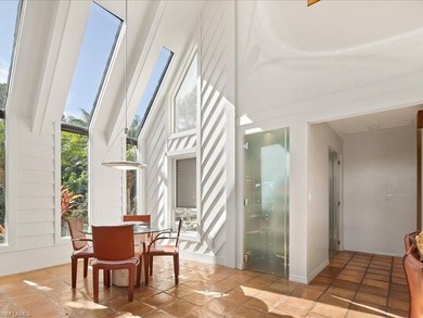 Set behind a curtain of mature landscaping and shimmering water - photo 34