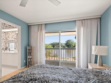 Set behind a curtain of mature landscaping and shimmering water - photo 41