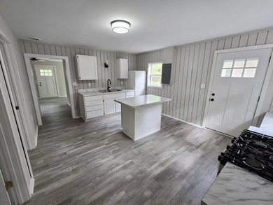 This 2 bedroom home has been completely remodeled top to bottom - photo 3