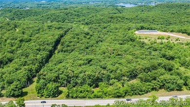 Prime highway front acreage ready for building a new commercial - photo 11