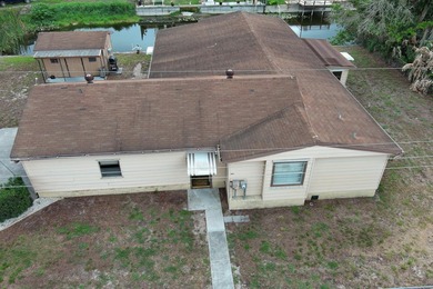 FULLY FURNISHED waterfront home on .35 acres in Glades County - photo 1