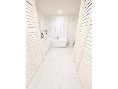 Welcome to this spacious and well-maintained 4-bedroom, 2-bath - photo 12