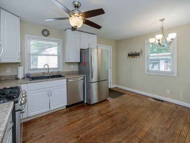 Adorable two bedroom, ranch style home, has hardwood floors - photo 8