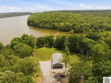 Welcome to your dream waterfront retreat on highly sought-after - photo 3