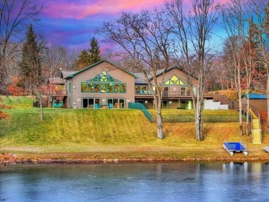 Lake Home For Sale in Elk Twp, Michigan