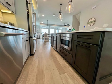 Welcome to this stunning Dean Adams-built beach block 5-bedroom