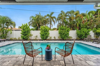 Welcome to this exceptional 3-bedroom, 2-bath home featuring a - photo 1