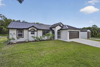 This nicely renovated home is move-in ready. Newly painted - photo 2