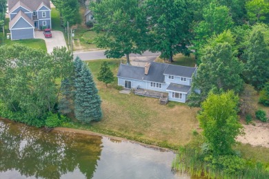 Lake Home For Sale in Canadian Lakes, Michigan
