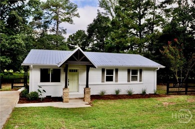 This adorable ranch in Oconee County has been completely - photo 1
