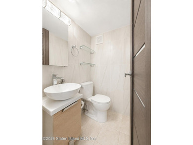 Nestled in the highly desirable Richmond Town section of Staten - photo 17