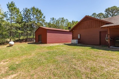 Looking for the country cozy charm of a Satterwhite Log Home on - photo 21