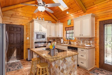 Looking for the country cozy charm of a Satterwhite Log Home on - photo 35
