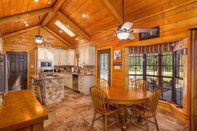 Looking for the country cozy charm of a Satterwhite Log Home on - photo 39