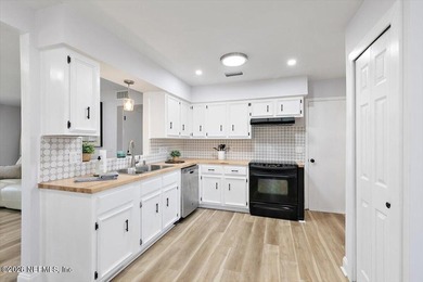 Welcome to this beautifully updated home located in a - photo 7