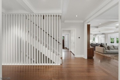Nestled in the desirable Poet Section of Short Hills, this - photo 2