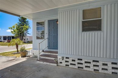 Welcome to Terra Ceia Manor, a quaint 55+ manufactured home - photo 5