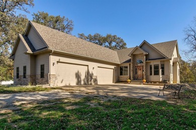 Lake Home For Sale in Winterset, Iowa