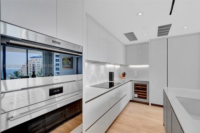 WELCOME HOME to the Four Seasons Private Residence 802. This 2 - photo 12