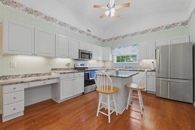 Welcome home to 1305 Walton Heath Drive! Nestled in the Island - photo 13