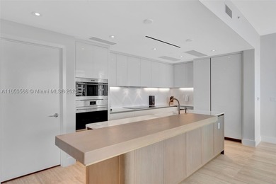 WELCOME HOME to the Four Seasons Private Residence 802. This 2 - photo 14