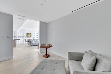 WELCOME HOME to the Four Seasons Private Residence 802. This 2 - photo 17