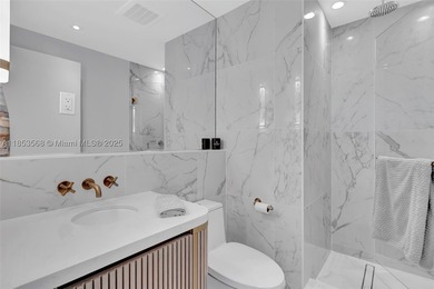 WELCOME HOME to the Four Seasons Private Residence 802. This 2 - photo 21