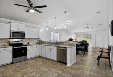 No HOA! Exceptional 4BR/2BA/2-car garage in booming Palm City - photo 5