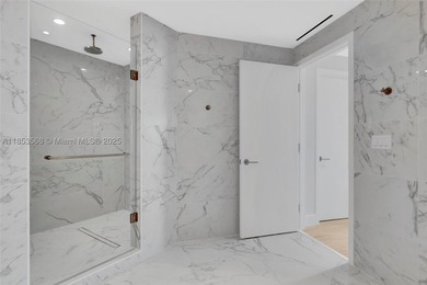 WELCOME HOME to the Four Seasons Private Residence 802. This 2 - photo 27