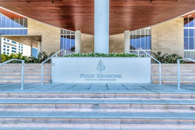 WELCOME HOME to the Four Seasons Private Residence 802. This 2 - photo 32