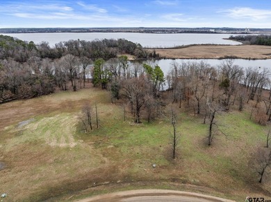 Discover the perfect waterfront retreat with this 1.09 +/- acre - photo 11