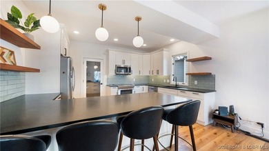 Lakefront living on a FLAT lot w/ HUGE view in the heart of - photo 16