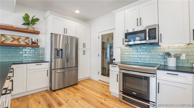 Lakefront living on a FLAT lot w/ HUGE view in the heart of - photo 18