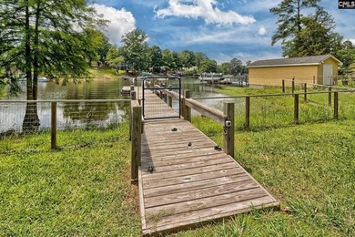 PRICED TO SELL! Lake Murray waterfront opportunities at this - photo 4