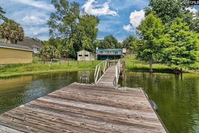 PRICED TO SELL! Lake Murray waterfront opportunities at this - photo 6