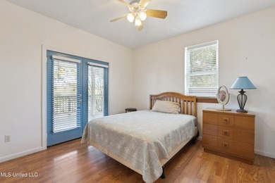 Classic elevated coastal cottages at 10450 MS 603 in Bay St - photo 5